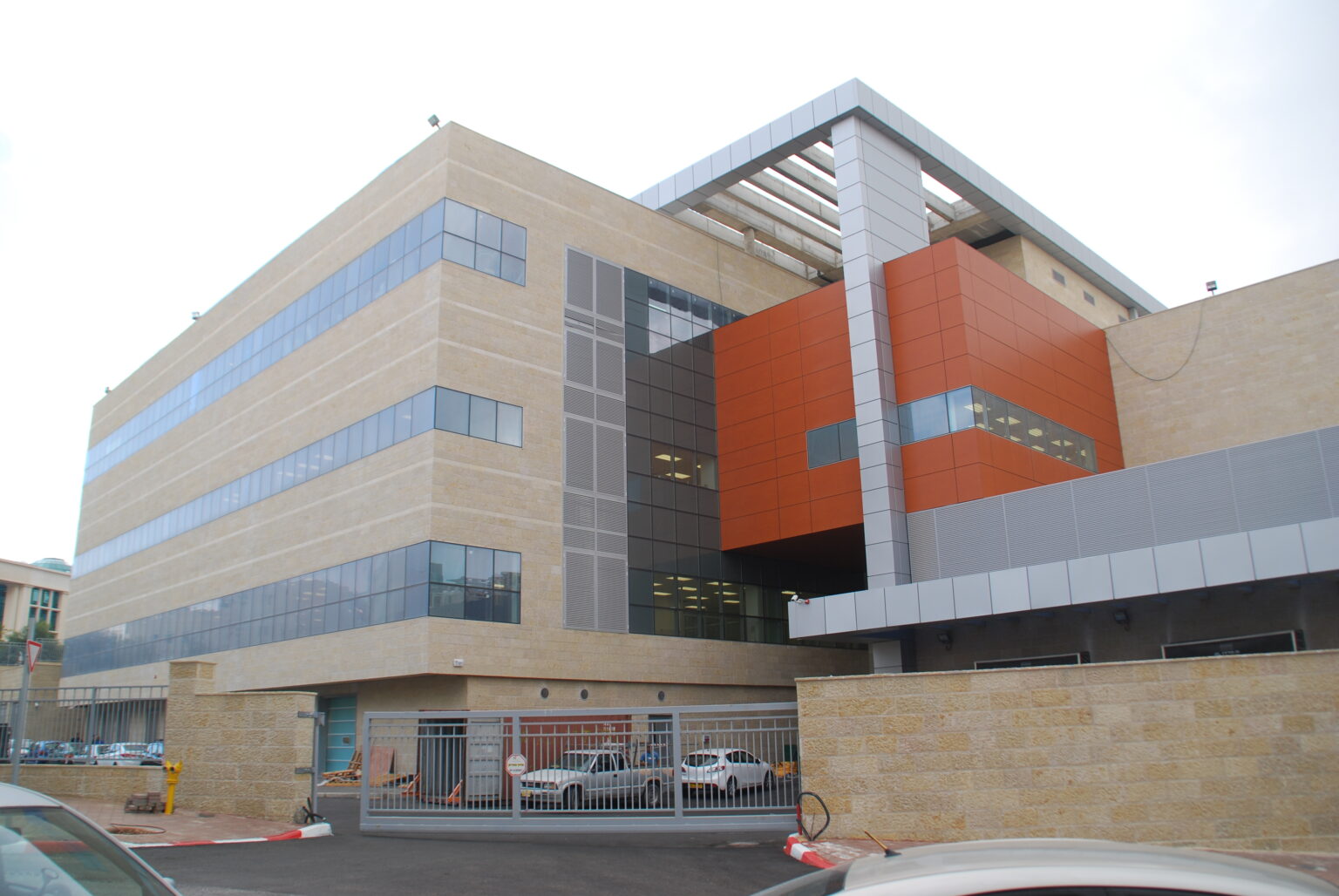 Facade of the Rafa building with orange panel accents