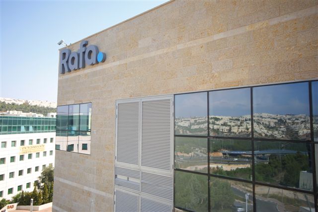 Exterior of the Rafa building with company signage on the stone facade