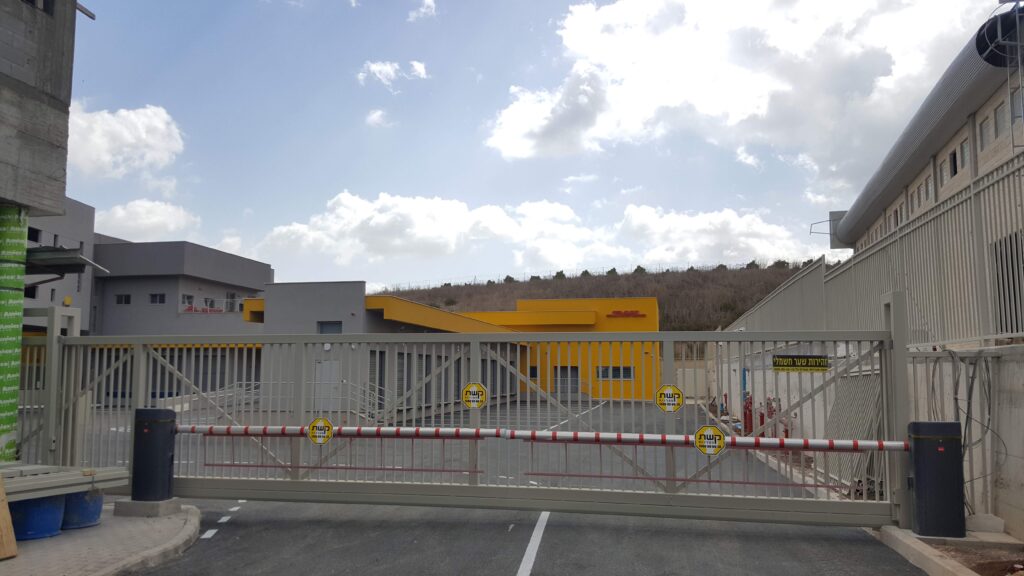 Entrance gate and yard at the DHL Mevo Carmel centre