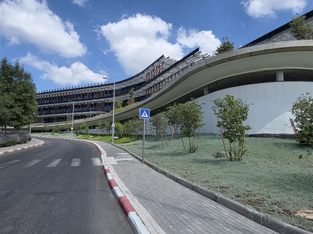Curved facade of the Beit Shulamit Cancer Center at Emek Medical Center, Afula