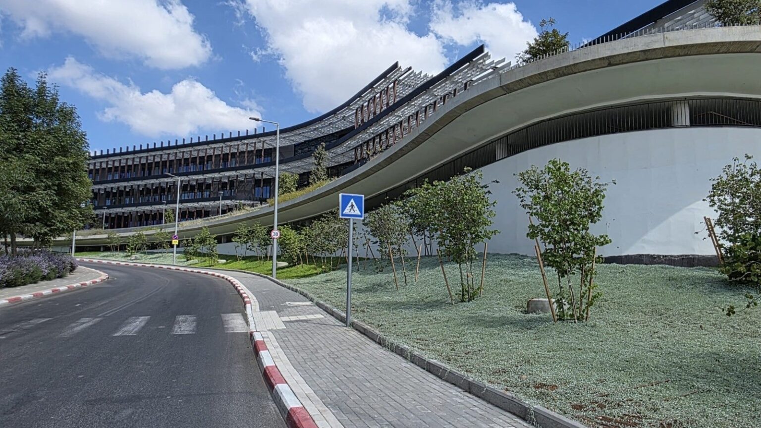 Curved facade of the Beit Shulamit Cancer Center at Emek Medical Center, Afula