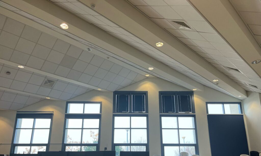 A hall after restoration with new ceiling and lighting