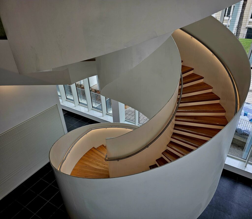 Spiral staircase with oak treads inside the TAU Nanotechnology Center